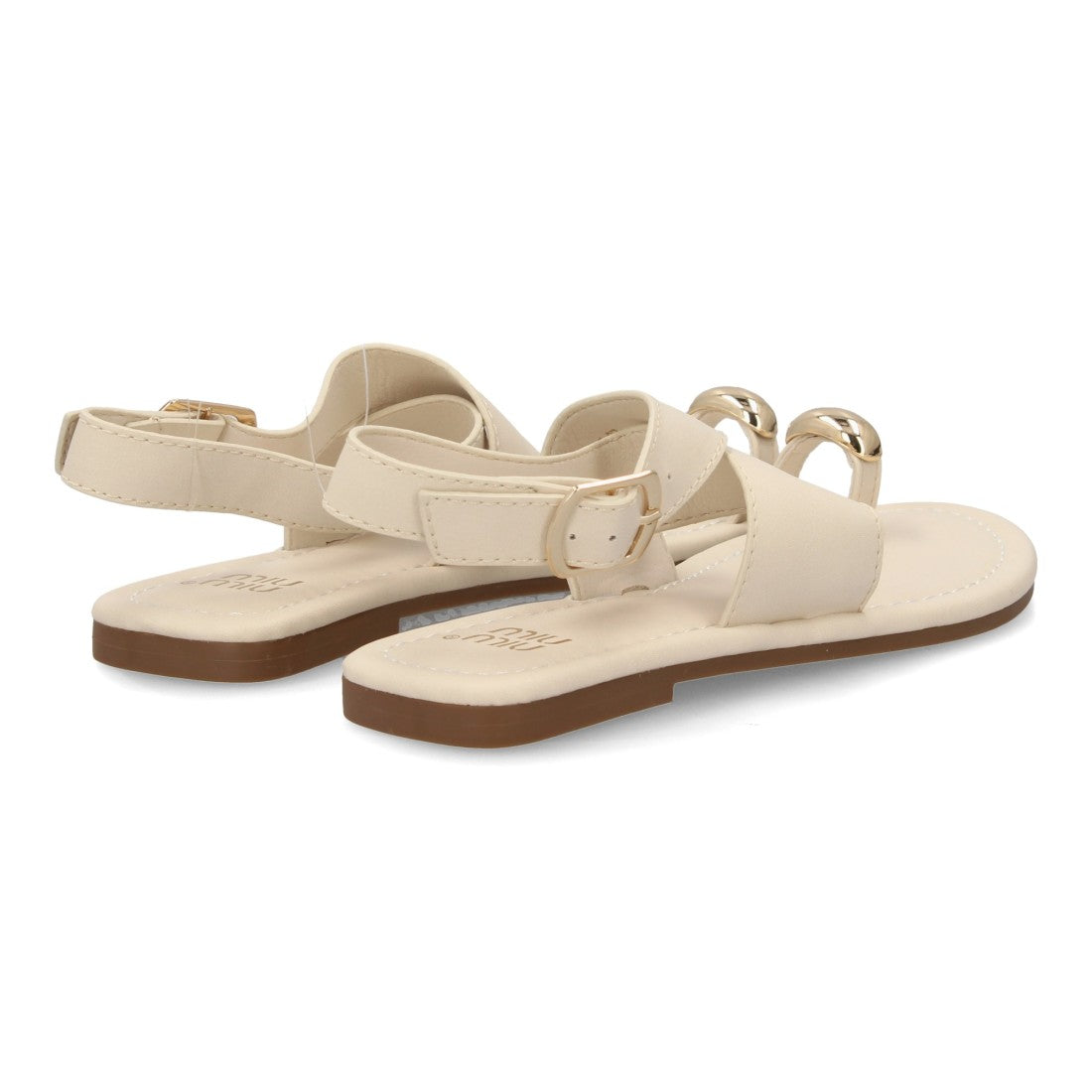 Sandalia plana minimalista beige con tiras cruzadas
