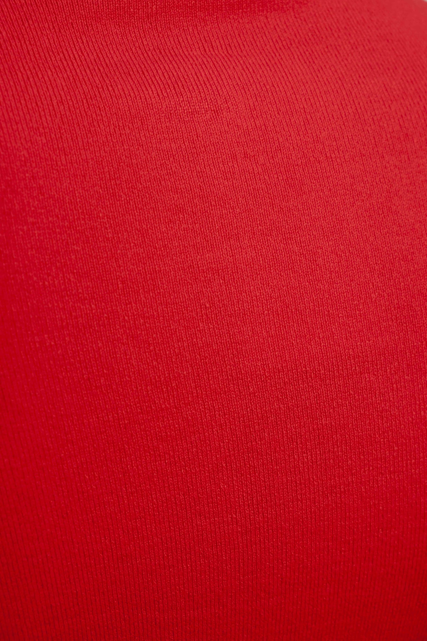Jersey punto rojo cuello subido aberturas puños