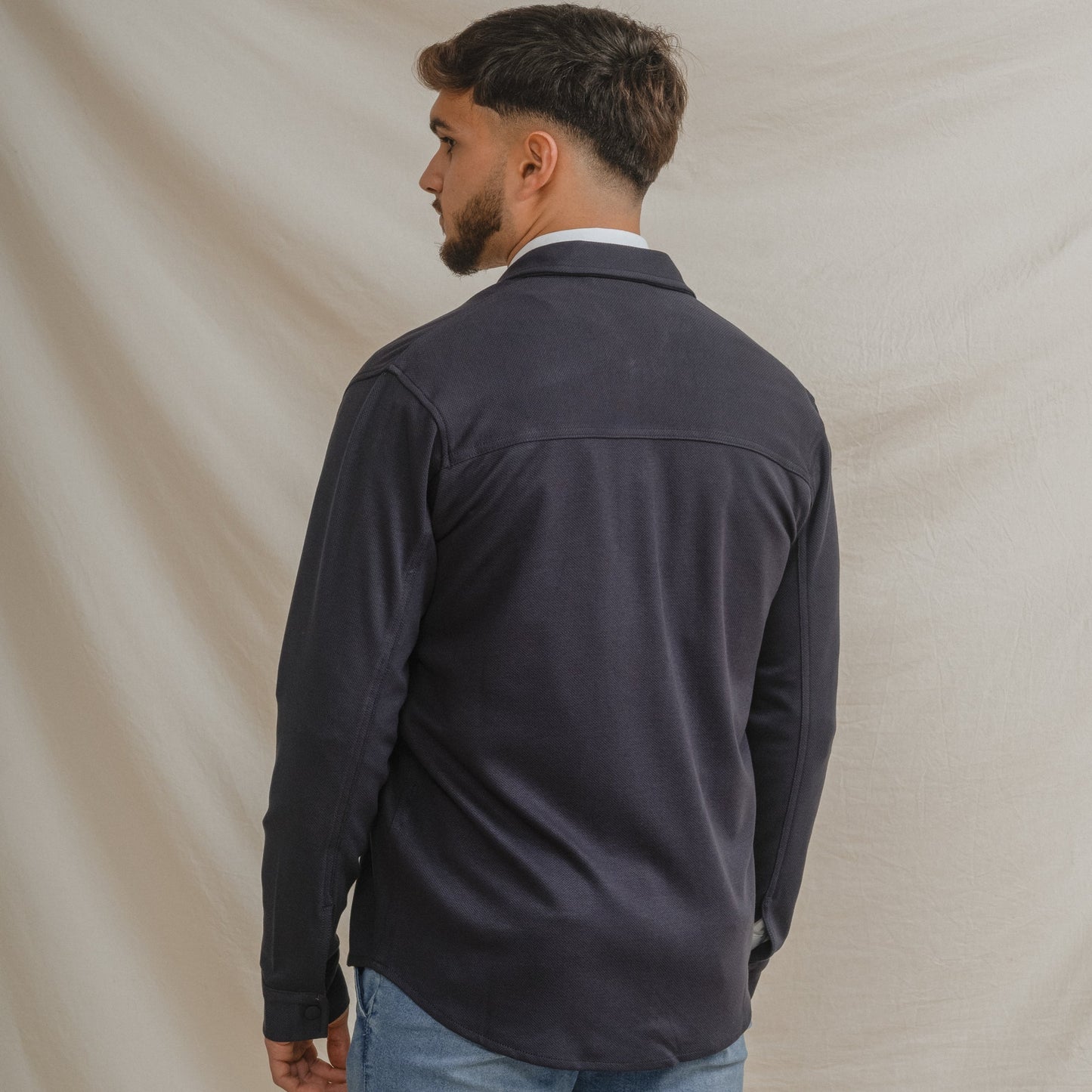 Sobrecamisa de punto azul para hombre con bolsillos de parche