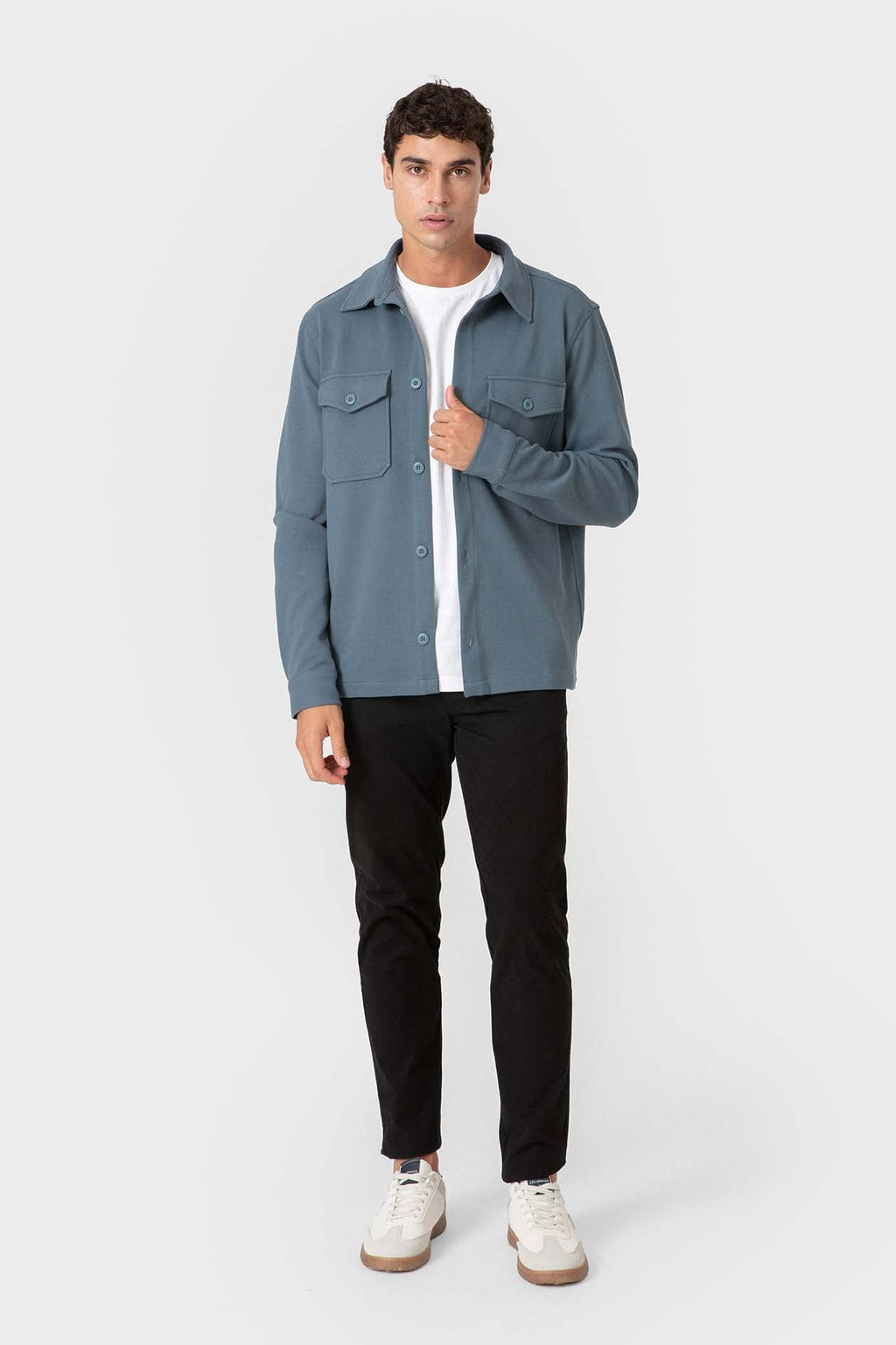 Sobrecamisa azul de punto diagonal de hombre con dos bolsillos