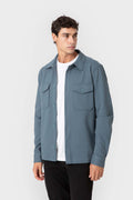 Sobrecamisa azul de punto diagonal de hombre con dos bolsillos