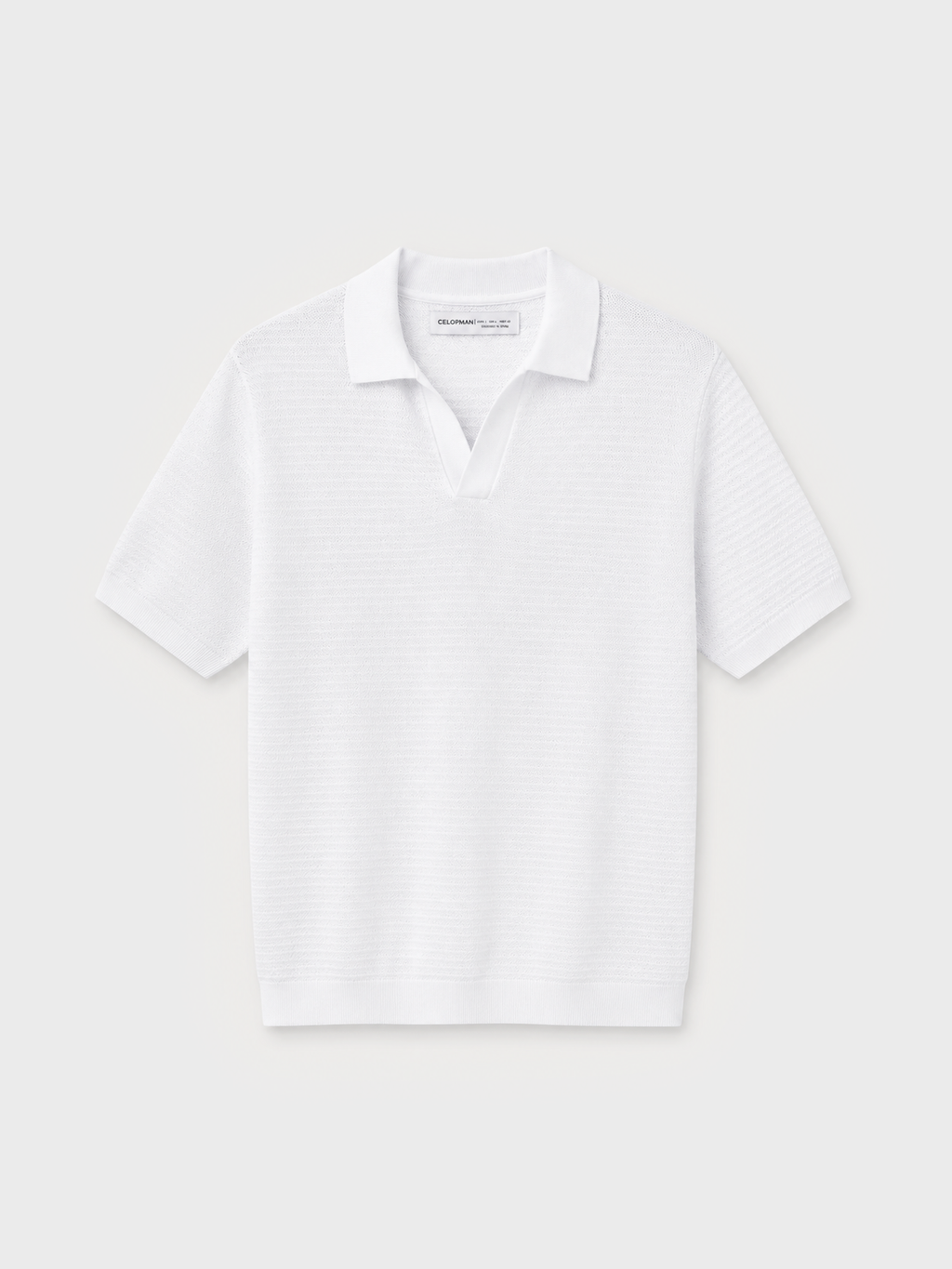 Polo de punto blanco con textura y manga corta para hombre