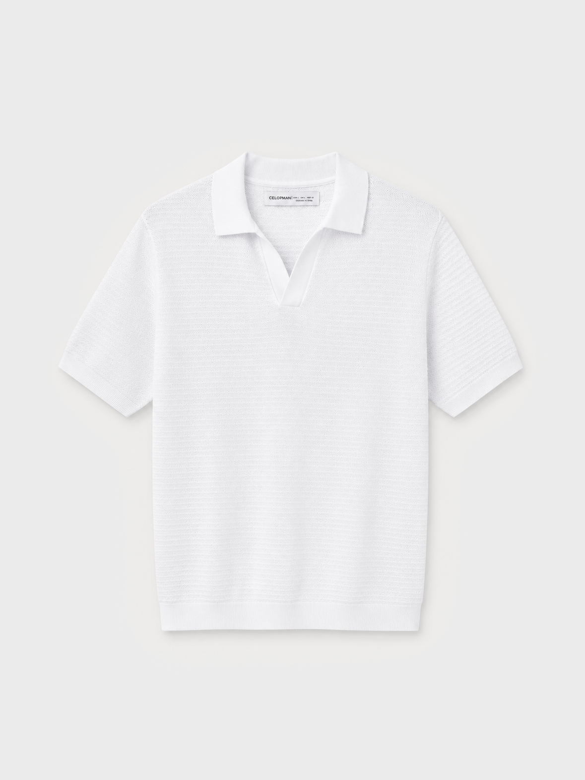 Polo de punto blanco con textura y manga corta para hombre