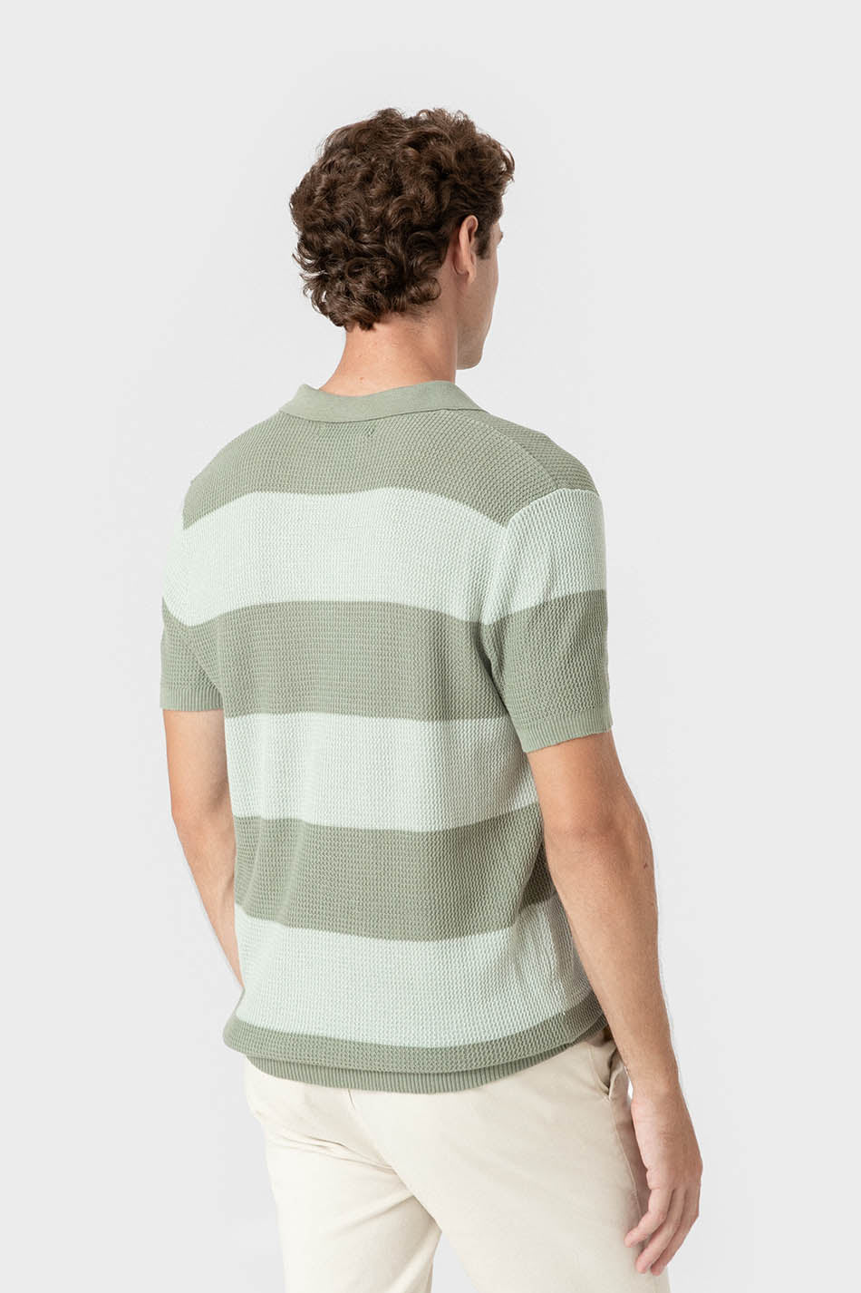 Polo verde de punto canalé panelado para hombre