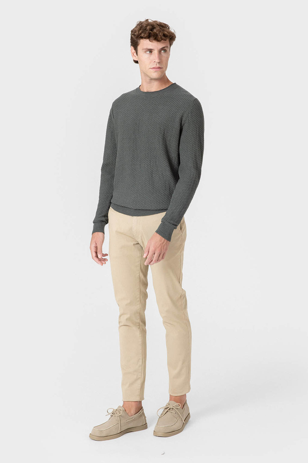 Jersey verde de algodón con textura de ladrillo