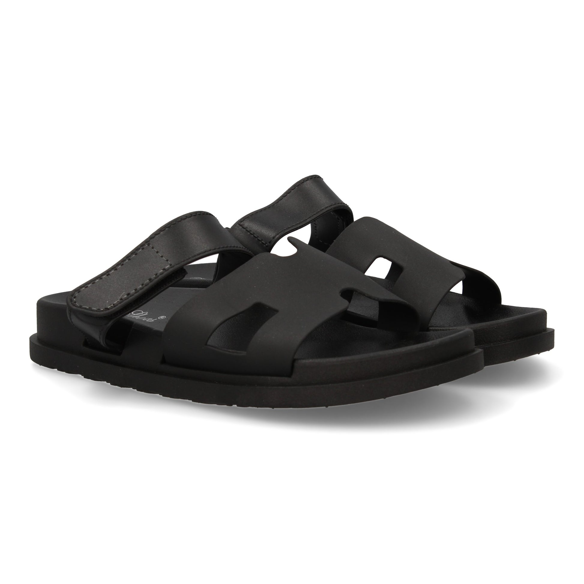 Chanclas negras de mujer con adorno en la pala y cierre de velcro, cómodas para el verano.
