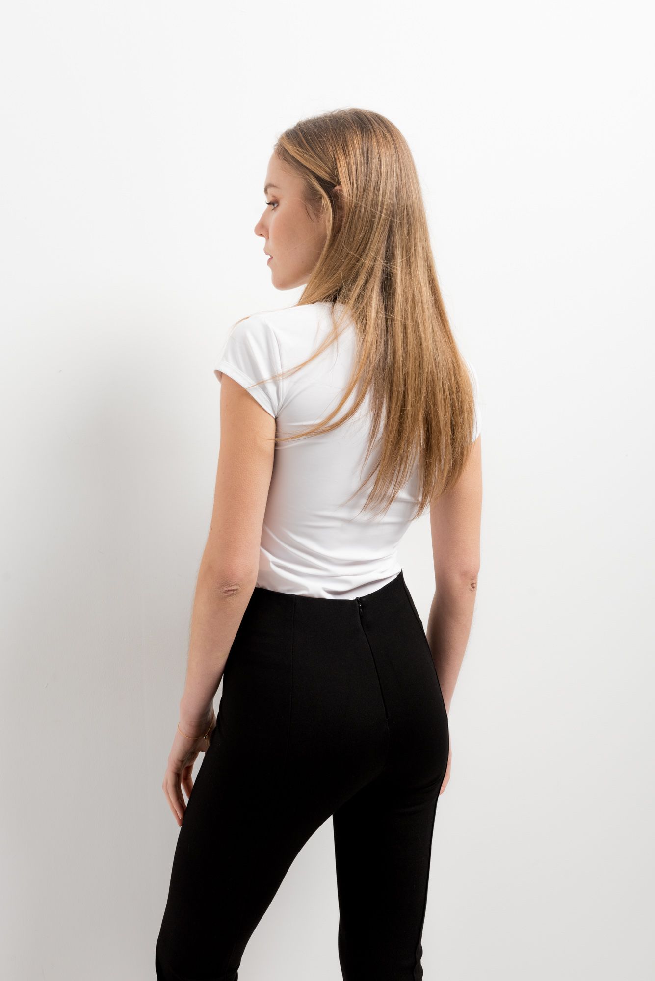 Leggings flare negro abertura bajo elásticos
