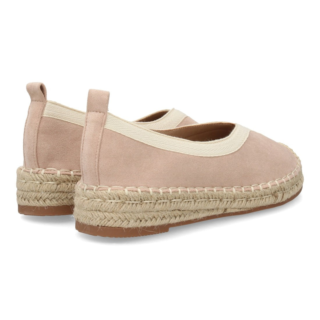 Alpargata plana rosa con punta cerrada y suela de yute tradicional.