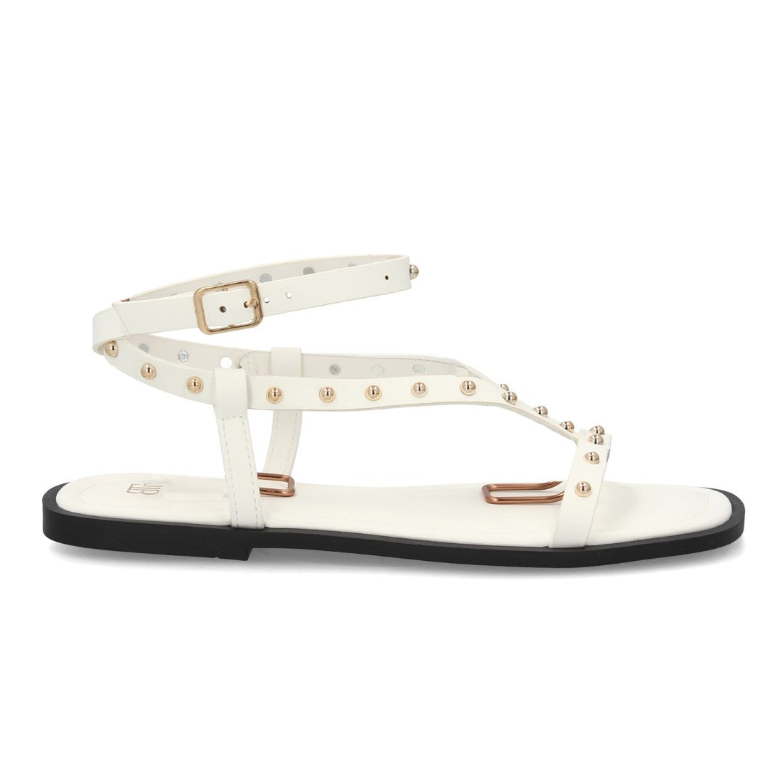 Sandalia plana blanca con tachuelas metálicas estilo romano