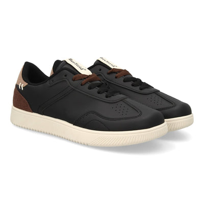 Zapatillas casuales barefoot de color negro con cordones y suela flexible plana