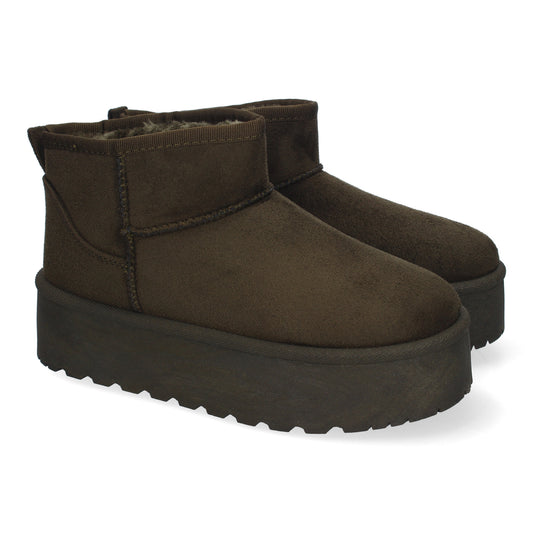 Botín plano australiano verde de mujer, plataforma, forrado de pelo, punta redonda.