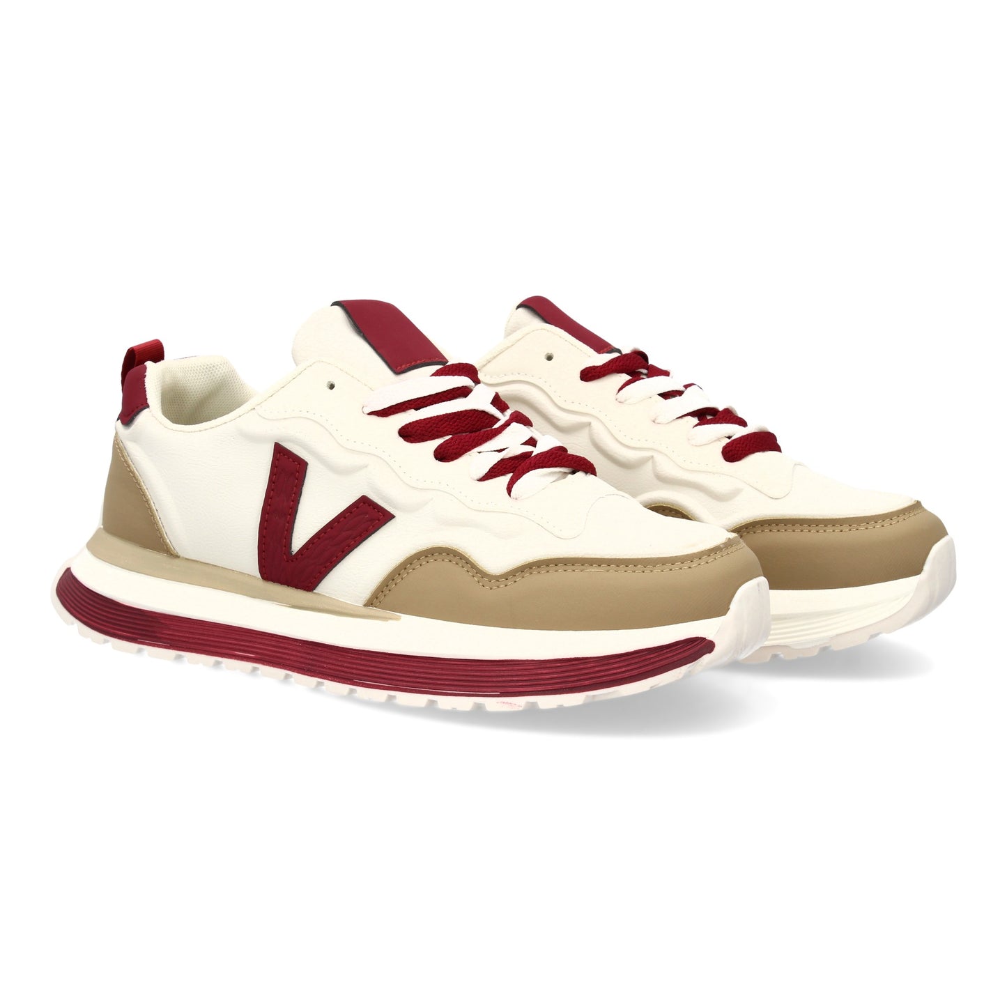 Zapatilla deportiva de hombre apricot con suela dentada y cierre de cremallera.