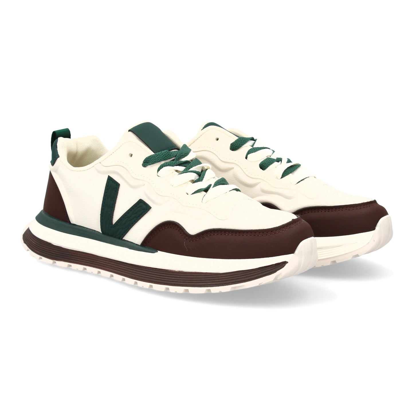 Zapatilla deportiva de hombre café con suela dentada y cierre de cremallera.