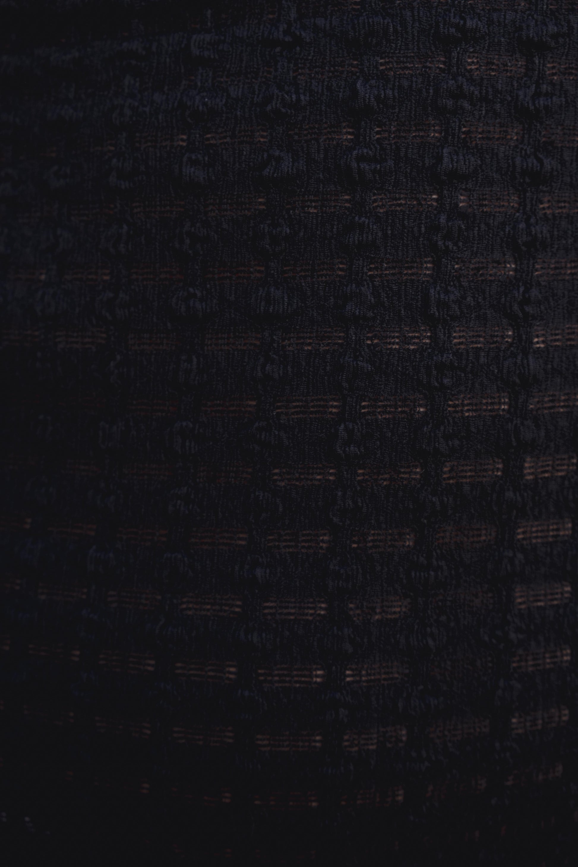Vestido midi negro punto calado asimétrico