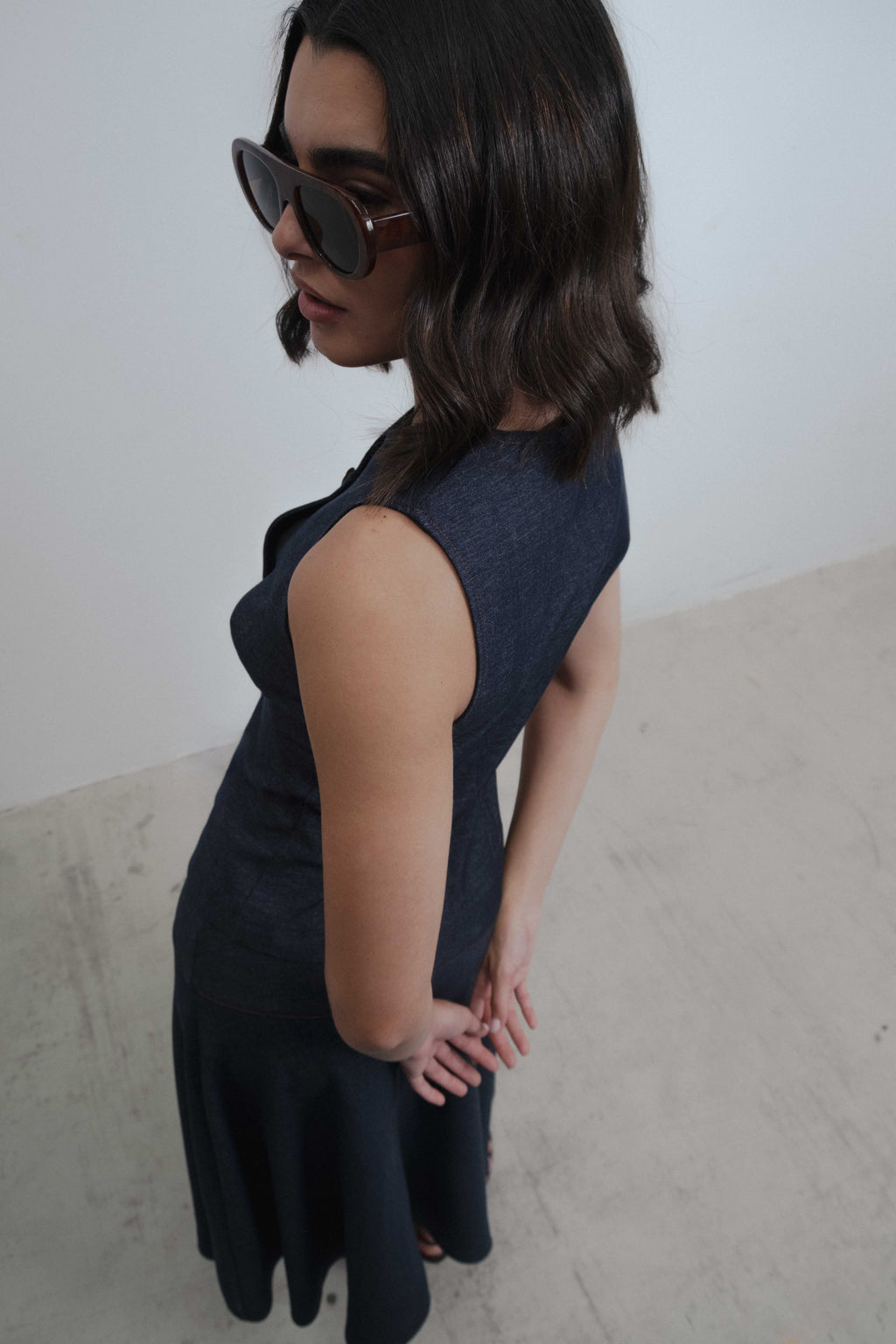 Chaleco cruzado de efecto denim con cuello redondo y botones para mujer
