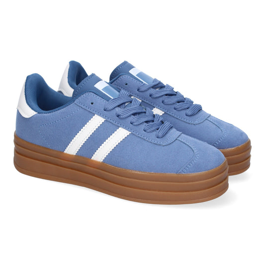 Zapatilla deportiva azul de mujer con doble suela, elegante y moderna.