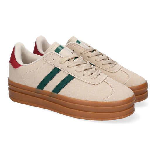 Zapatilla deportiva beige de mujer con doble suela, elegante y moderna.