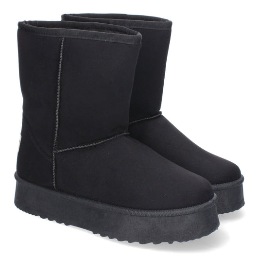 Botines estilo australiano de mujer color negro, lisos, de plataforma, forrados en pelo y con detalles de costura.