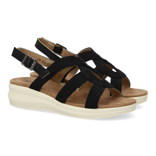 Sandalia plana de mujer color negro, cómoda, elegante, tiras cruzadas y cierre de hebilla.