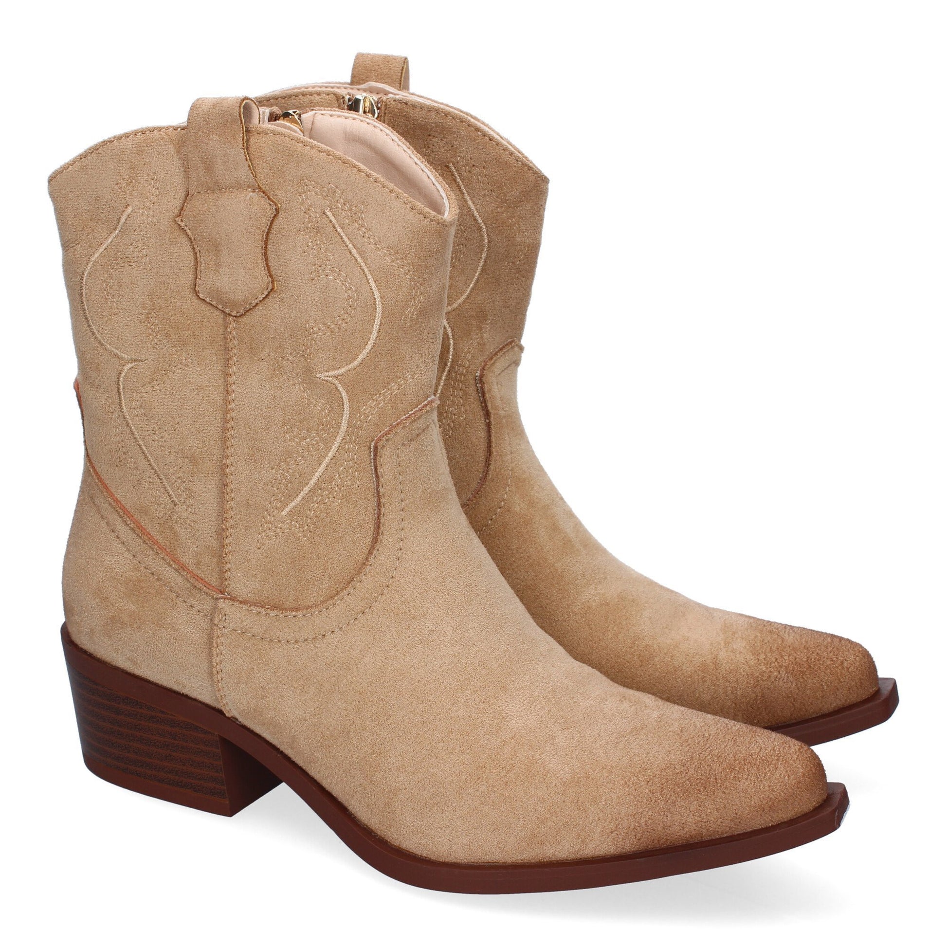 Botines de mujer estilo vaquero color beige. Diseño elegante y confortable para uso diario.