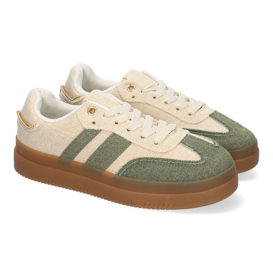Zapatillas casual de mujer color verde con cremallera lateral. Calzado cómodo y moderno para uso diario.