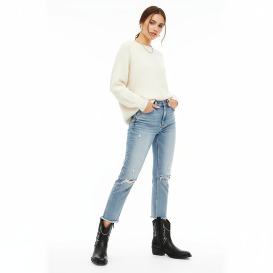 Botín de mujer color negro con acabado de ante sintético, tacón cuadrado y cremallera.