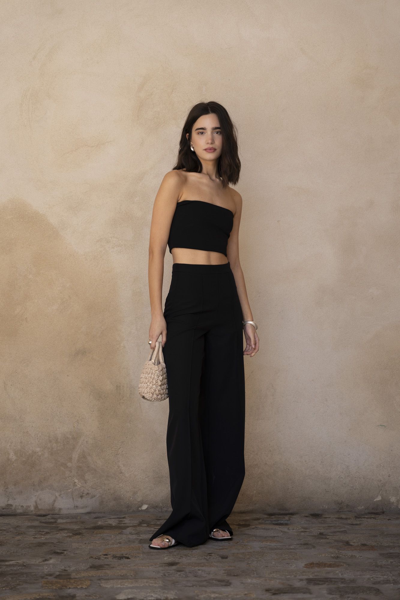 Pantalón fluido liso de pernera ancha y caída ligera