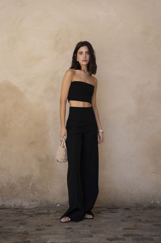 Pantalón fluido liso de pernera ancha y caída ligera