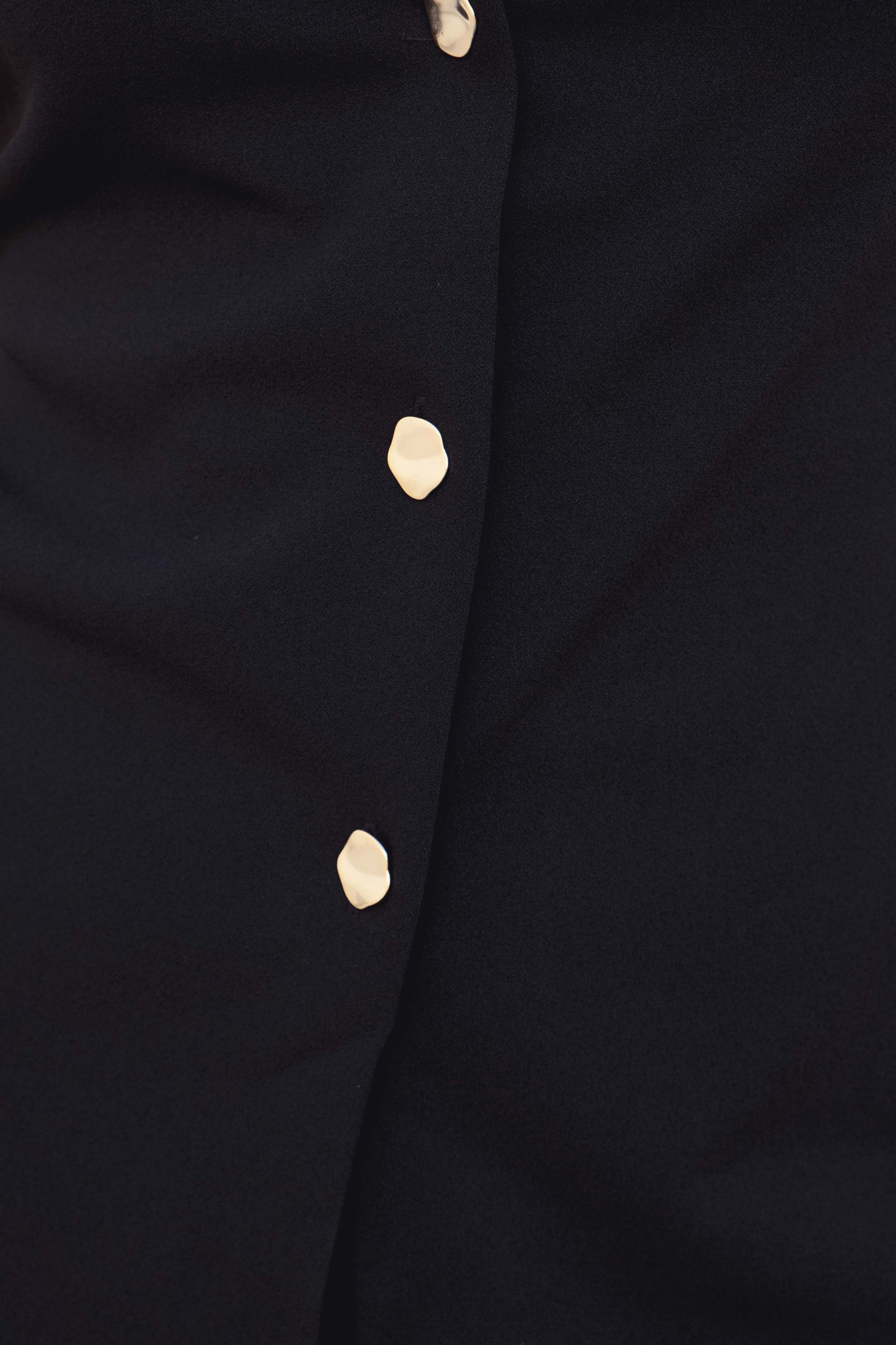 Top chaleco lino negro botones frontales sin mangas elegante