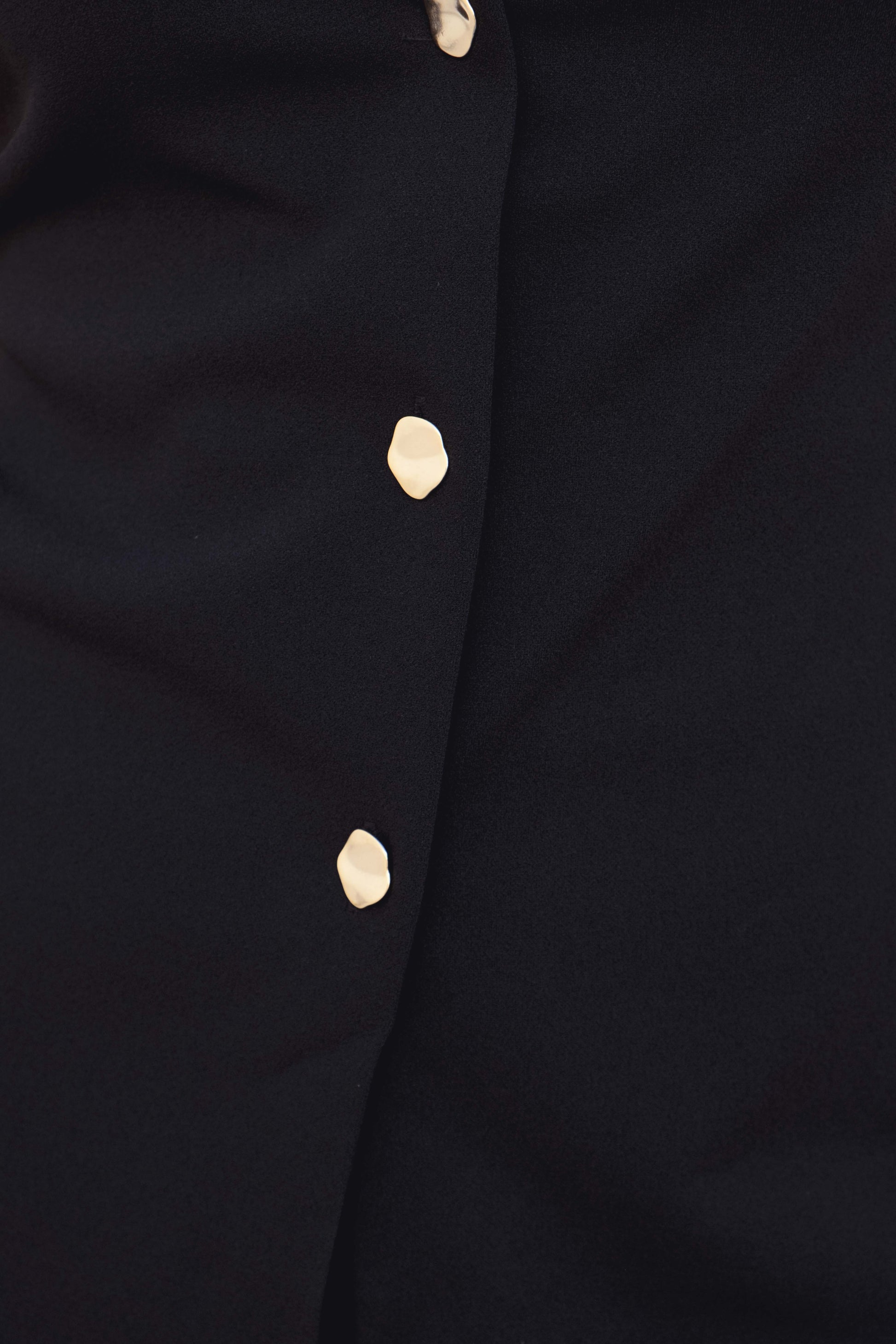 Top chaleco lino negro botones frontales sin mangas elegante