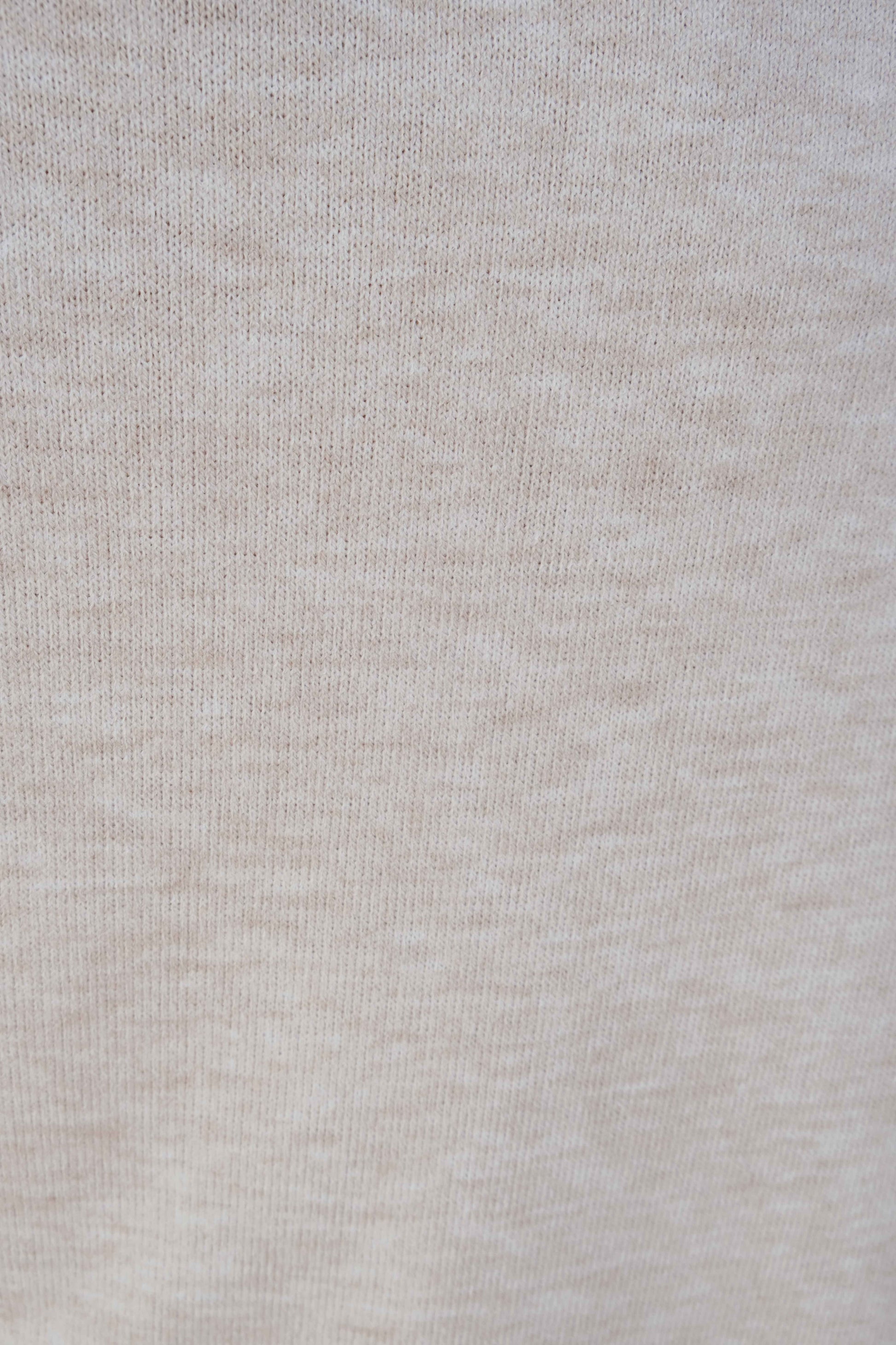 Pantalón ancho de punto beige para mujer estilo relajado diseño español