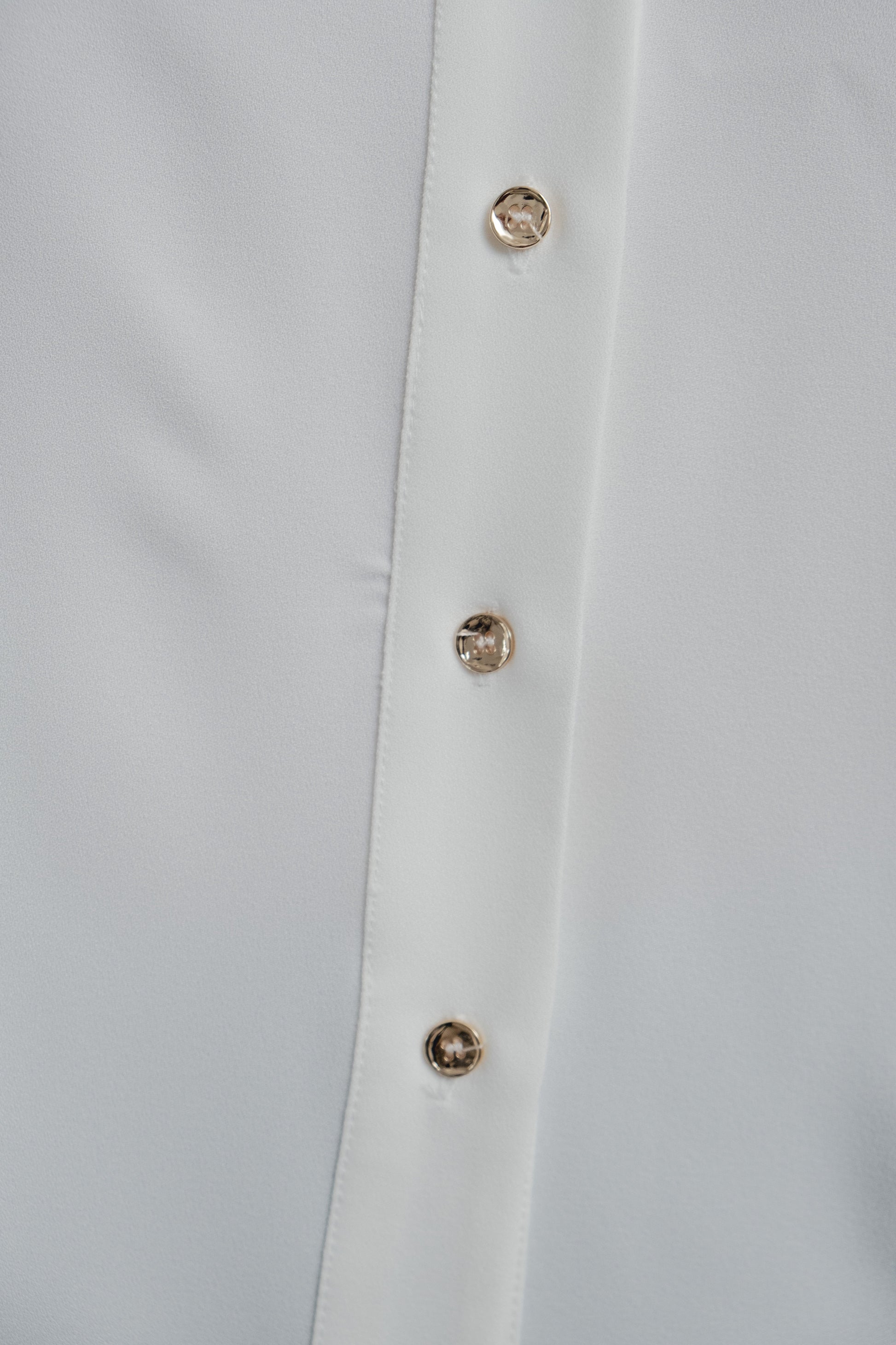 Camisa crudo manga ancha vuelta diseño español