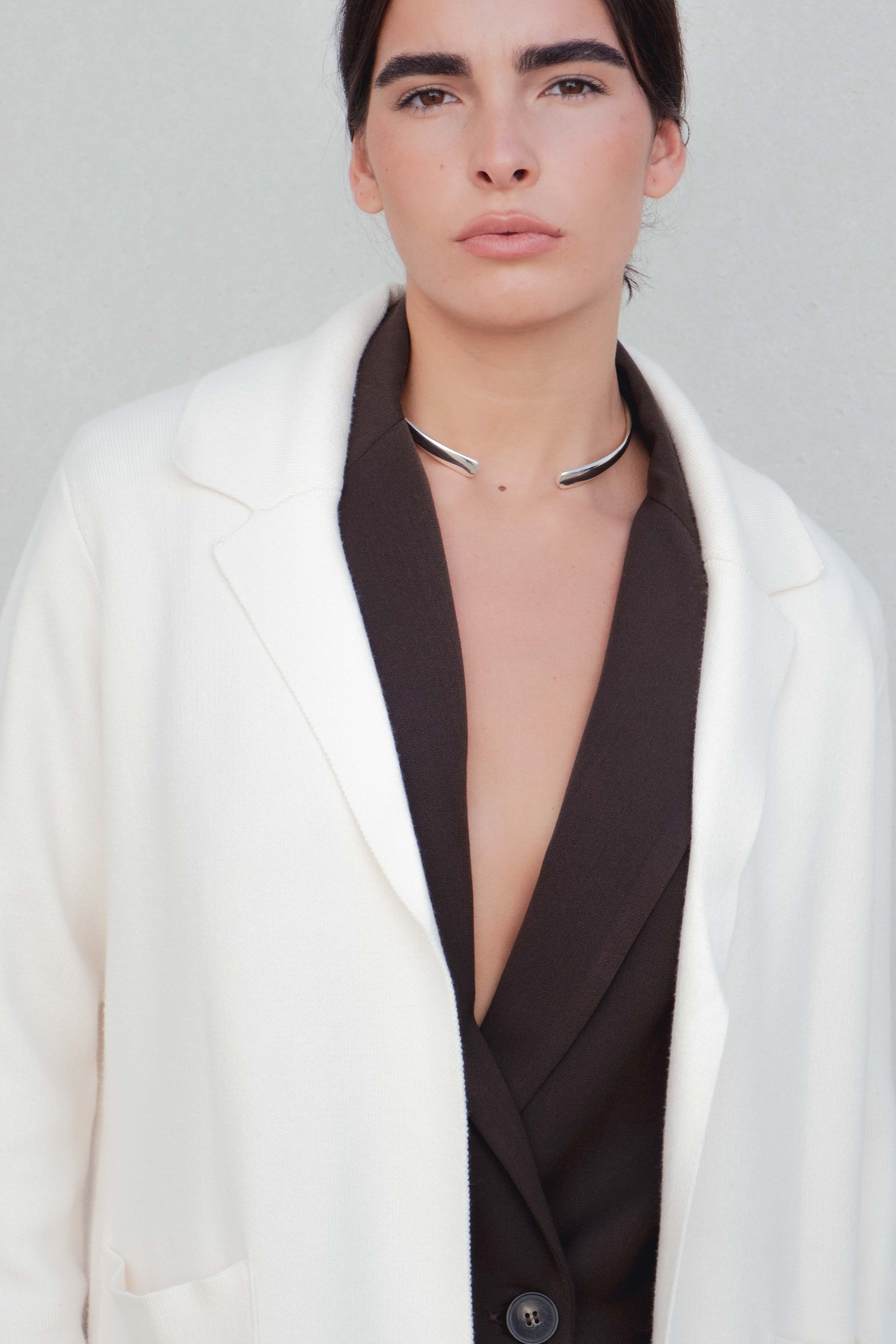 Abrigo oversize punto beige largo con solapas