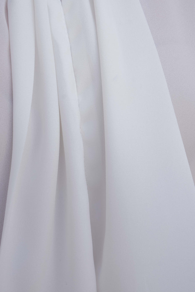 Blusa de manga larga con lazada en el cuello