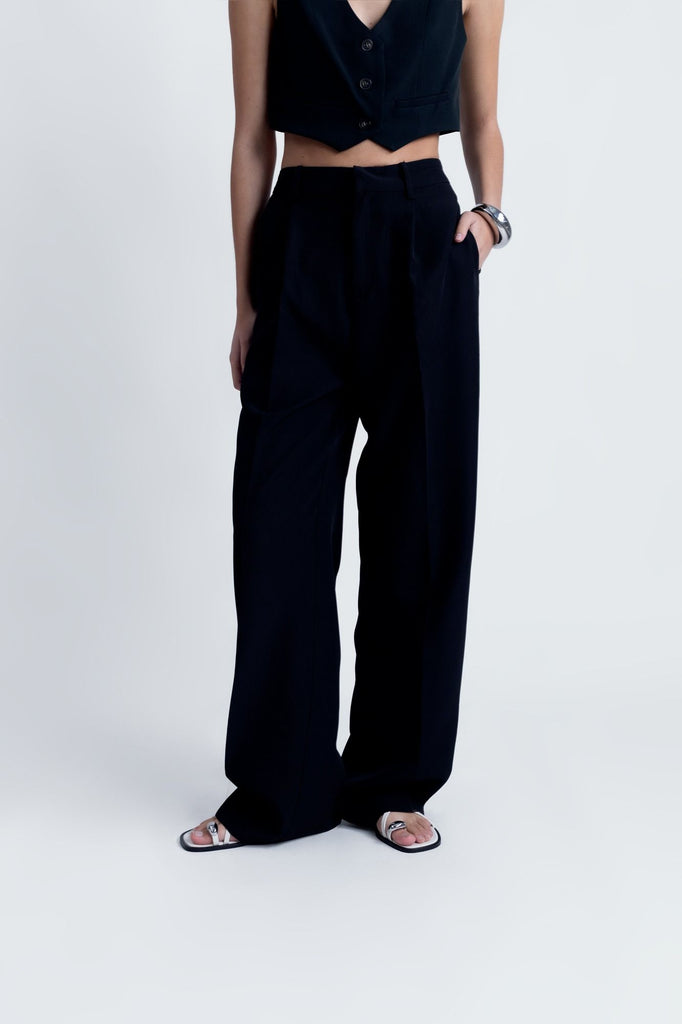 Pantalón de Pliegues de Corte Sastre